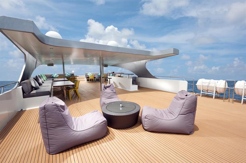 Gaia Love Sun Deck with purple bean bags.