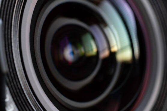 Close-up,Camera,Lens,With,Color,Reflections
