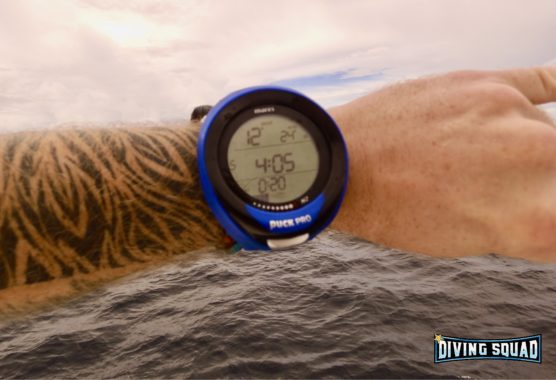 Original photo of the Mares Puck Pro on a wrist against the sea in the Maldives