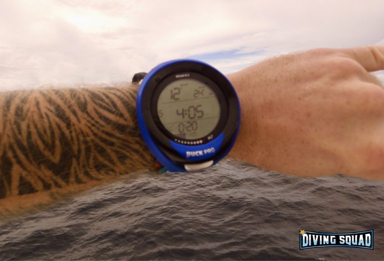 Original photo of the Mares Puck Pro on a wrist against the sea in the Maldives