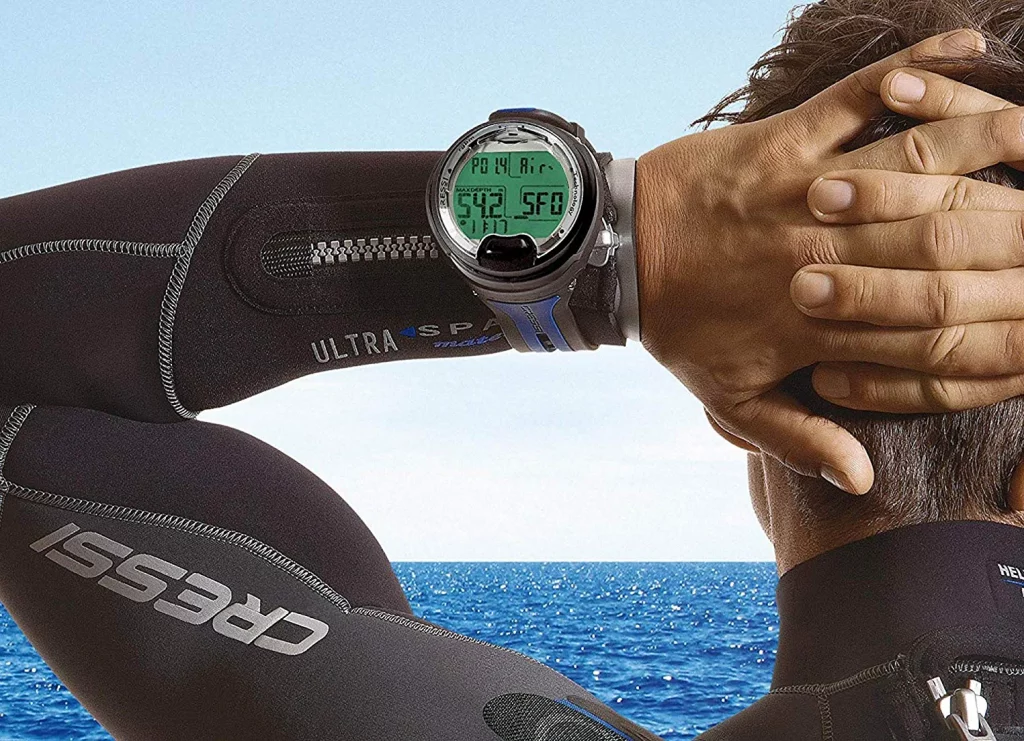 Cressi leonardo on divers wrist as they scour the horizon.