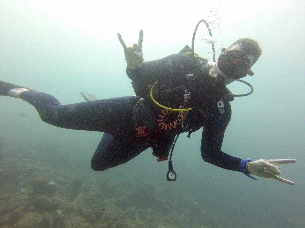 Scuba diver wearing the Mares X-Vision mask underwater.