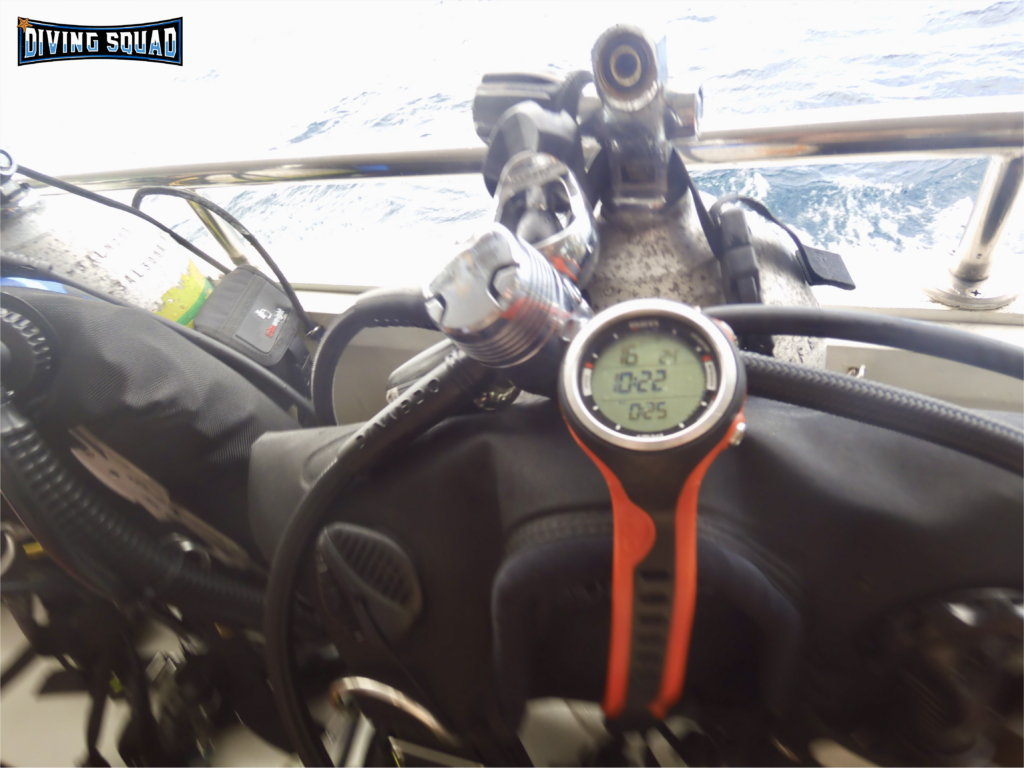 Original photo of Mares Smart Air dive computer resting on a bcd and regulator on a diving donny.