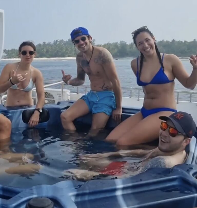 Laura and other guests in the hot tub of the Iruvai Maldives liveaboard.