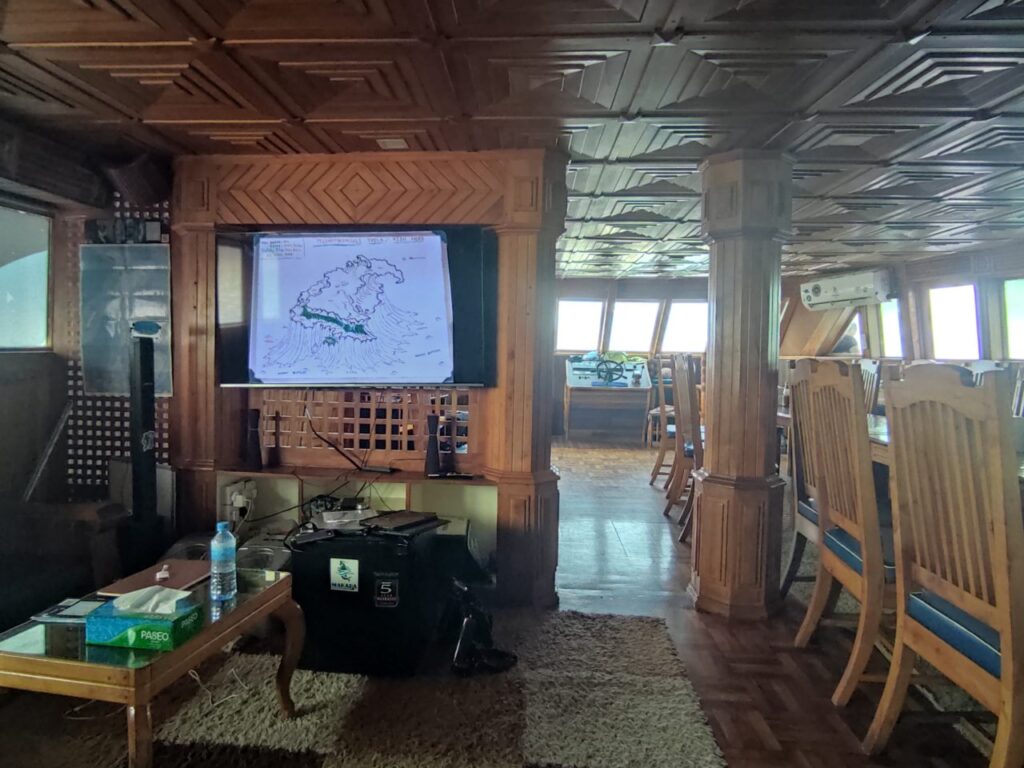 Indoor saloon of Iruvai liveaboard.