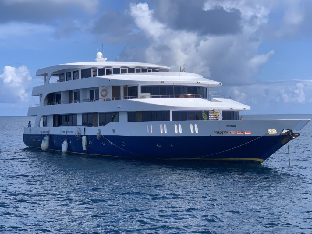 Soleil 2 Maldives liveaboard against blue ocean background.