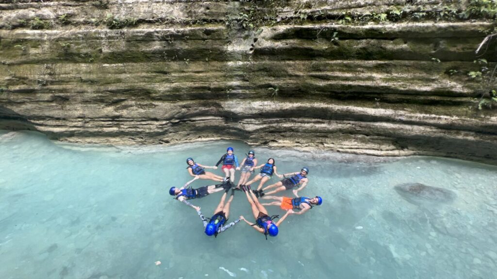 Group of backpackers on the canyoneering trip near Moalboal