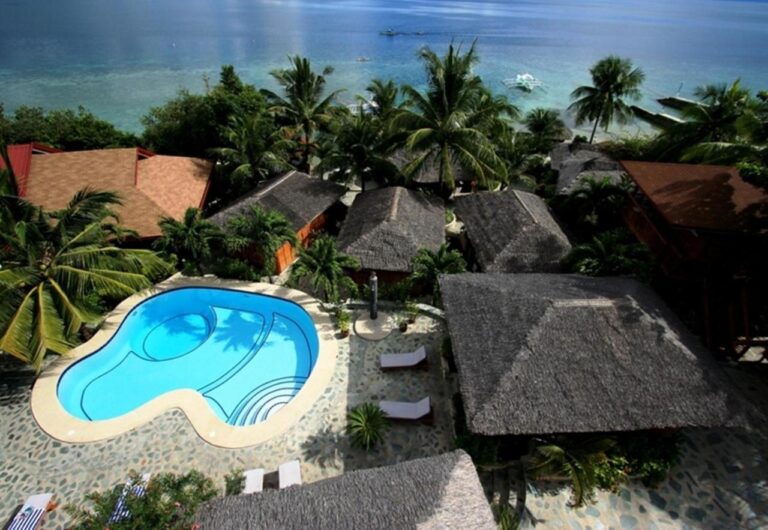 Magic Island Dive Resort 小屋與海景