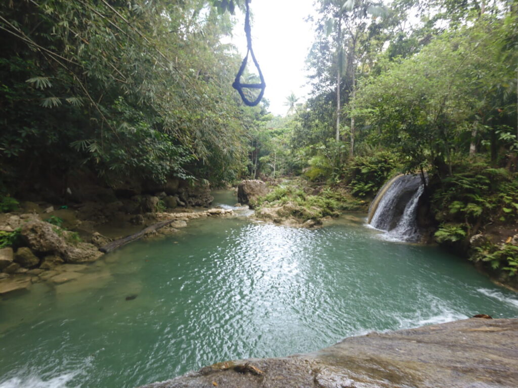 Kinamandagan waterfall with rope swing.