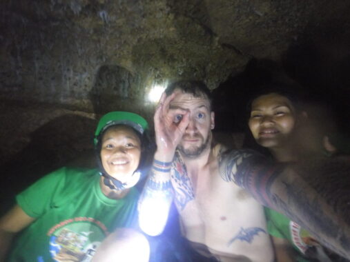 Alex, founder of Diving Squad with two guides in Cantabon Cave.