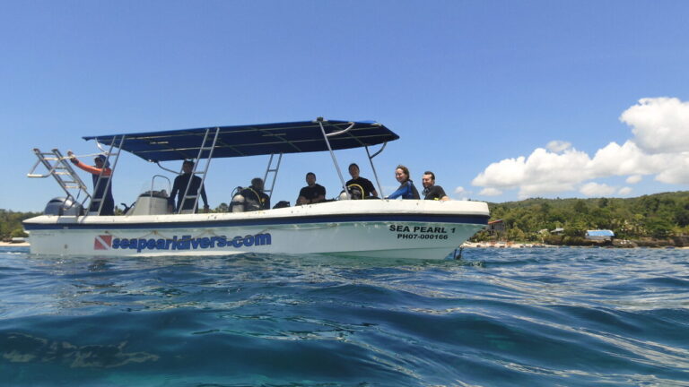 Dive boat of Sea Pearl dive centre on the water.