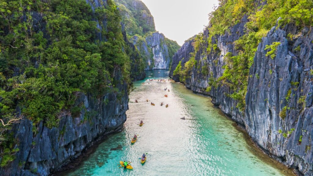 Kayakers in a lagoon of El Nido