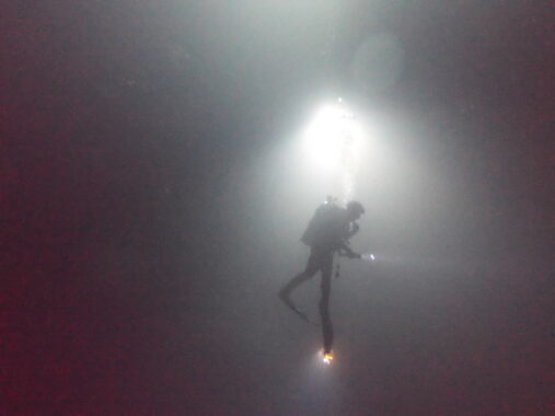 Blackwater diving - diver silhouette.