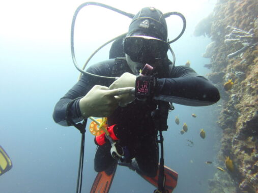 Mark - scuba diving guide, shows off his awesome dive computer