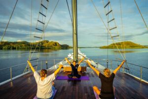 Guests enjoying guided yoga aboard Scubaspa Zen