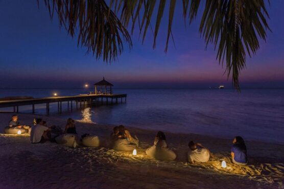 Guest enjoying beautiful beach sunset.