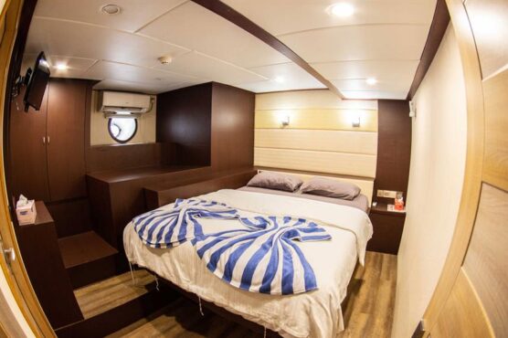 Huge double bed on lower deck cabin.