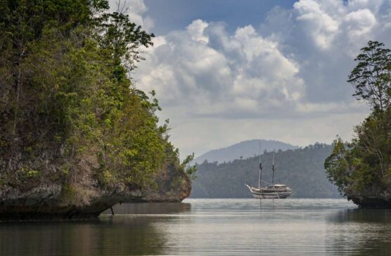 liveaboard vessel cruising between islands