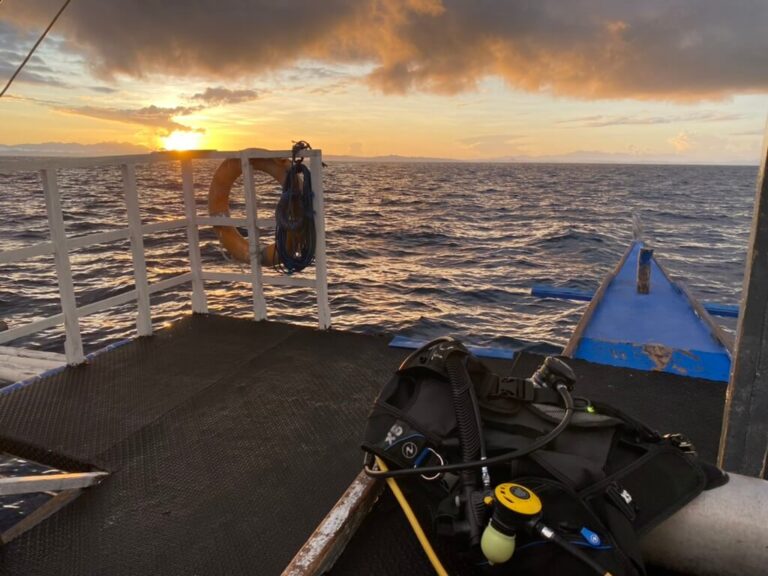 Sunrise over ocean on boat headed to Kinad Shoal to dive with Thresher sharks