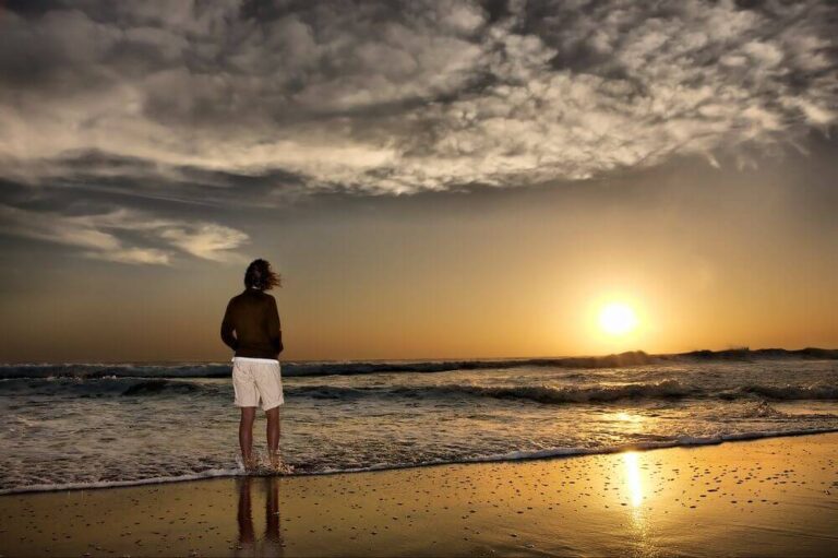 man at the beach sunset