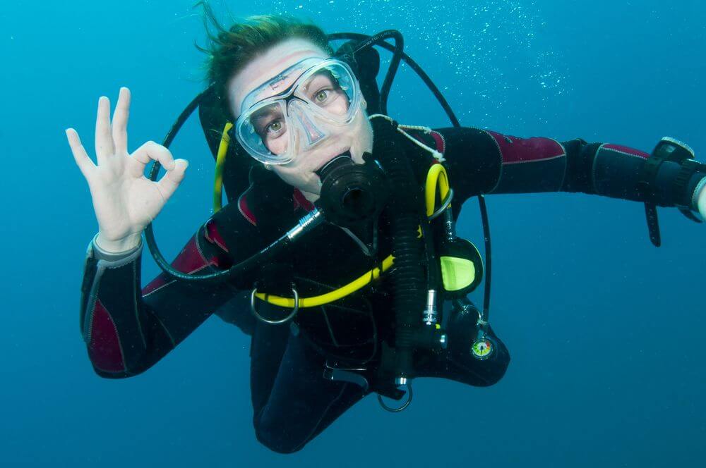 scuba diver posing on camera