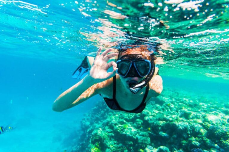 woman underwater snorkeling